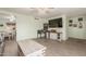 Bright living room with a ceiling fan, modern entertainment center, and light, airy feel at 8626 E San Miguel E Ave, Scottsdale, AZ 85250