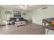 Cozy living room featuring a plush sofa, stylish coffee table, and bright decor at 8626 E San Miguel E Ave, Scottsdale, AZ 85250