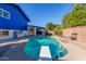 Refreshing backyard pool with diving board and patio area, perfect for outdoor relaxation at 8626 E San Miguel E Ave, Scottsdale, AZ 85250