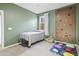 bedroom featuring a climbing wall, twin bed, and neutral carpeting at 864 W Blue Ridge Dr, San Tan Valley, AZ 85140