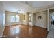 Bright dining area boasts wood floors, natural light, and decorative wall accents at 8861 W Paradise Dr, Peoria, AZ 85345