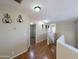 Well-lit hallway featuring decorative accents and access to various rooms at 8861 W Paradise Dr, Peoria, AZ 85345