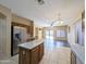 Open kitchen view showcasing a center island, stainless steel appliances, and breakfast area at 8861 W Paradise Dr, Peoria, AZ 85345