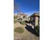 Community playground featuring colorful play structures and a slide, set amidst well-maintained landscaping and residential buildings at 910 W Aspen Way, Gilbert, AZ 85233