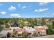 Residential community with terracotta roofs, mature trees, and well-maintained landscaping at 9115 W Kimberly Way, Peoria, AZ 85382