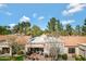 Aerial view of private backyard patio with seating and BBQ in a lush green setting at 9115 W Kimberly Way, Peoria, AZ 85382