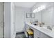 Bright bathroom featuring double sinks, and vanity at 9115 W Kimberly Way, Peoria, AZ 85382