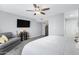 Cozy main bedroom with a ceiling fan and a view of the tv at 9115 W Kimberly Way, Peoria, AZ 85382