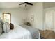 Stylish main bedroom with wood floors and neutral decor at 9224 E Windrose Dr, Scottsdale, AZ 85260