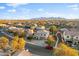 Aerial view of suburban neighborhood with mountain views and well-maintained yards at 925 E Doris St, Avondale, AZ 85323