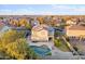 Aerial view of home with a pool, solar panels, and a landscaped yard at 925 E Doris St, Avondale, AZ 85323