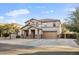 Charming two-story home with desert landscaping, covered entry, and a two car garage at 925 E Doris St, Avondale, AZ 85323