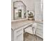 Elegant bathroom vanity with a large mirror, ample counter space, and detailed cabinetry at 9430 N 25Th St, Phoenix, AZ 85028