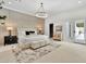 Well-appointed main bedroom with neutral tones, an accent wall, stylish lighting, and access to the en-suite at 9430 N 25Th St, Phoenix, AZ 85028