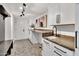 Mudroom features custom cabinets, ample counter space, and stylish tile flooring at 9430 N 25Th St, Phoenix, AZ 85028