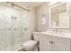 Clean bathroom featuring glass shower with tile, vanity, and fixtures at 9460 N 92Nd St # 119, Scottsdale, AZ 85258