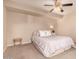 Relaxing main bedroom featuring plush carpeting, a ceiling fan, and a cozy ambiance at 9460 N 92Nd St # 119, Scottsdale, AZ 85258