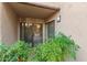 Cozy covered patio with slider to the living area and lush greenery surrounding at 9460 N 92Nd St # 119, Scottsdale, AZ 85258