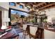 Stylish bar area with desert views and a modern bar with liquor shelf at 10040 E Happy Valley Rd # 289, Scottsdale, AZ 85255