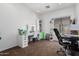 Bright bedroom with vanity, decorative shelves and plush carpet at 10212 W Wier Ave, Tolleson, AZ 85353