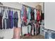 Walk-in closet with abundant hanging space and shelving for optimal storage at 10212 W Wier Ave, Tolleson, AZ 85353