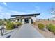 Community clubhouse exterior with well-maintained landscaping and desert plants at 10455 E Thornton Ave, Mesa, AZ 85212