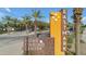 Community sign at the Home Finding Center entrance with manicured landscaping at 10455 E Thornton Ave, Mesa, AZ 85212