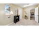 Bedroom with carpet flooring, a black bookcase, a window, and wall art at 10620 W Snead Dr, Sun City, AZ 85351