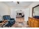 Inviting living room featuring hard floors and a view through french doors at 1165 W 4Th Ave, Apache Junction, AZ 85120