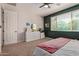 Bedroom with a large window for natural light and a dresser at 119 W Leatherwood Ave, San Tan Valley, AZ 85140