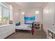 Bedroom featuring natural light, dresser and closet at 119 W Leatherwood Ave, San Tan Valley, AZ 85140