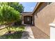 Inviting entrance with a landscaped front yard and a paved walkway to the front door at 119 W Leatherwood Ave, San Tan Valley, AZ 85140