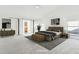 Staged main bedroom with vaulted ceiling and ensuite bathroom featuring sliding barn doors at 11942 N 95Th St, Scottsdale, AZ 85260