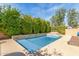 Backyard featuring a in-ground pool and jacuzzi at 12312 N 147Th Ln, Surprise, AZ 85379