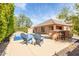 Inviting backyard pool with poolside seating and outdoor bar, perfect for entertaining and relaxation at 12312 N 147Th Ln, Surprise, AZ 85379