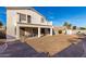 Large backyard with covered patio and second story balcony at 12809 W Evans Dr, El Mirage, AZ 85335