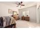 Bedroom featuring natural light, carpeted floors, and a ceiling fan at 12809 W Evans Dr, El Mirage, AZ 85335