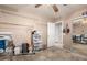 Bedroom with ceiling fan, closet organizer, and door to the ensuite bathroom at 12809 W Evans Dr, El Mirage, AZ 85335