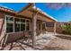 Inviting covered backyard patio with seating, perfect for outdoor living and entertaining at 1403 E Las Colinas Dr, Chandler, AZ 85249