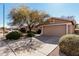 Charming single-story home with a two-car garage and well-maintained landscaping in a vibrant neighborhood at 1403 E Las Colinas Dr, Chandler, AZ 85249