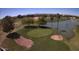 Golf course aerial showcasing a green, sand traps, and a scenic water feature at 1403 E Las Colinas Dr, Chandler, AZ 85249