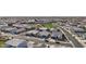 Panoramic aerial view of a residential neighborhood highlighting neat streetscapes and community green spaces at 14317 W Faye Way, Surprise, AZ 85387