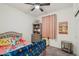 Comfortable bedroom featuring carpet, ceiling fan, and vibrant decor for a cozy space at 14317 W Faye Way, Surprise, AZ 85387