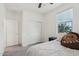 Bedroom with carpet flooring, a window, a closet and a bed at 14317 W Faye Way, Surprise, AZ 85387