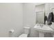 Powder room with a sink and a toilet at 14317 W Faye Way, Surprise, AZ 85387