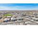 Extensive aerial view of a residential community with various single-Gathering homes and desert landscape at 14325 W Faye Way, Surprise, AZ 85387