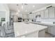 Bright kitchen featuring a large center island, modern appliances, and ample counter space at 14325 W Faye Way, Surprise, AZ 85387