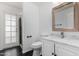 Bathroom featuring a white vanity with marble countertop, toilet, and shower with glass door at 14401 N 29Th St, Phoenix, AZ 85032