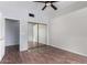 Bedroom featuring hard wood floor and mirror closet doors at 14401 N 29Th St, Phoenix, AZ 85032