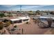 Aerial view of the backyard with patio and desert landscaping at 15602 N Nicklaus Ln, Sun City, AZ 85351